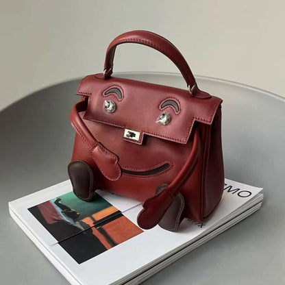 Hermès Kelly Doll in Rouge H Swift Leather with palladium Hardware
