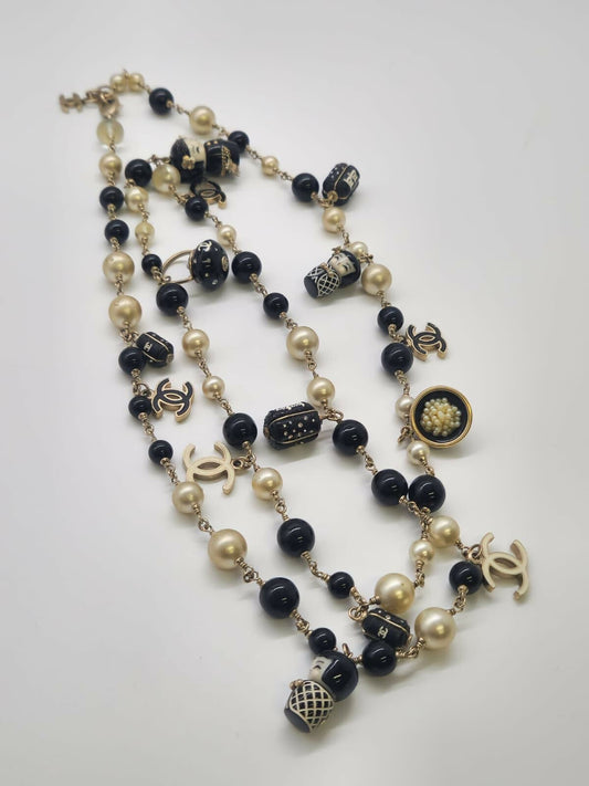 Chanel Vintage Shanghai Doll CC Necklace.