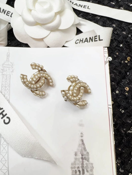 Chanel 15B clip-on earrings with double C logo and pearls