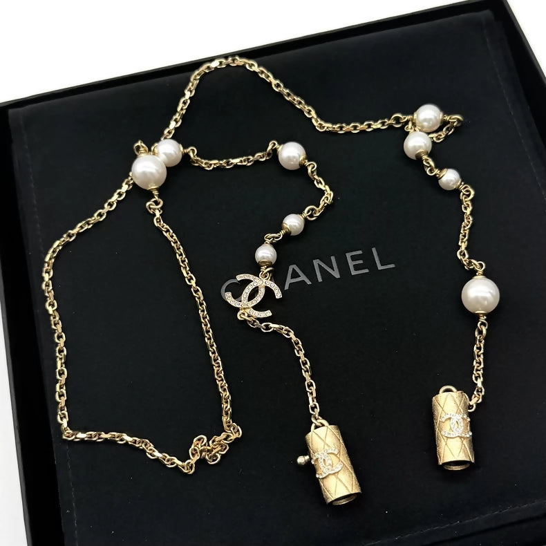 Chanel earphone chain and pearl necklace