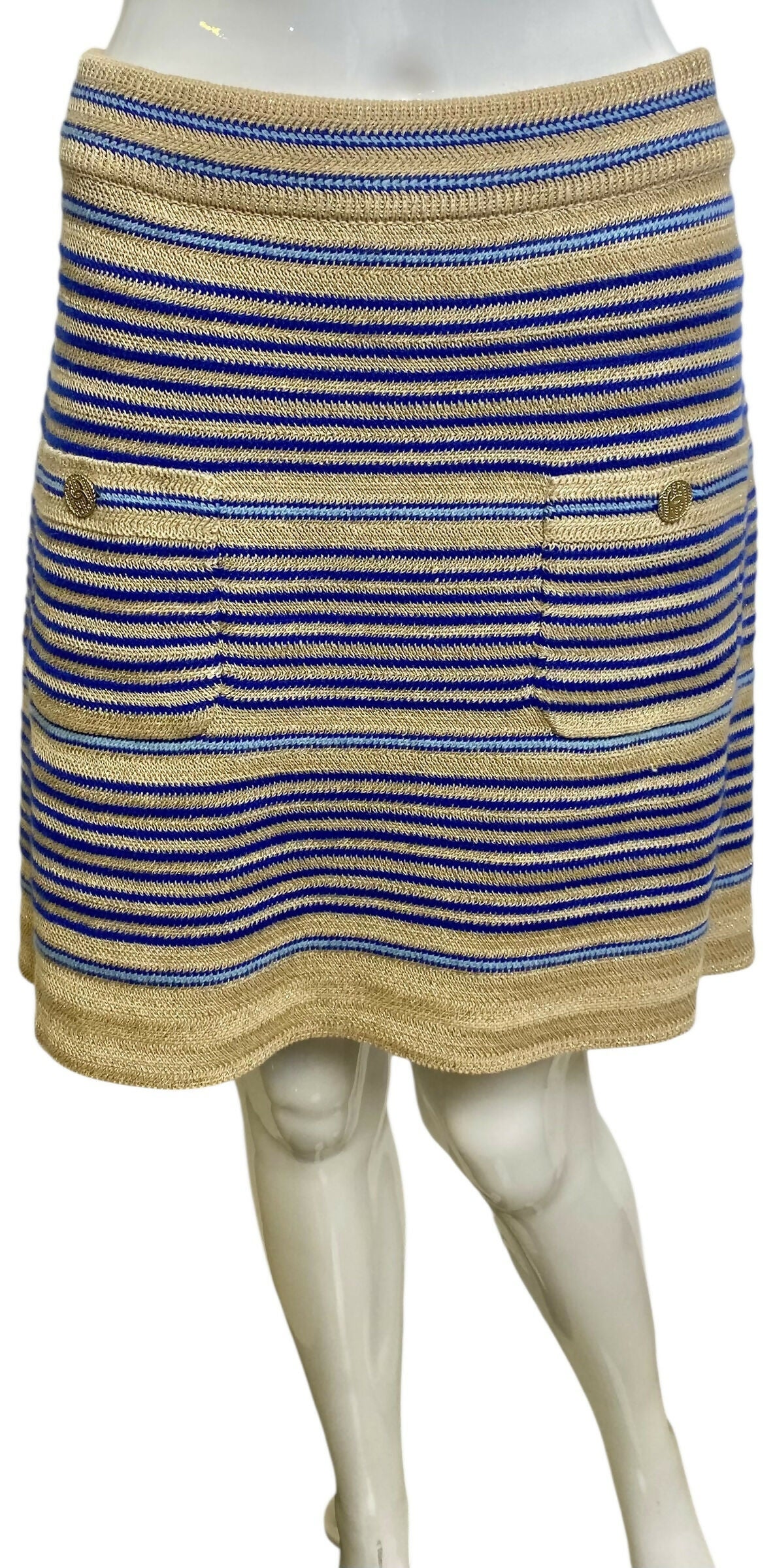 From the 2019 Cruise Resort La Pausa Collection by Karl Lagerfeld. Set Retail 5.5k Chanel Outfit in Metallic Striped Cardigan in Gold, Beige, and Blue Striped Linen Cashmere Blend with Matching Skirt. 2 Gold CC Buttons on Pockets and 2 on the skirt with