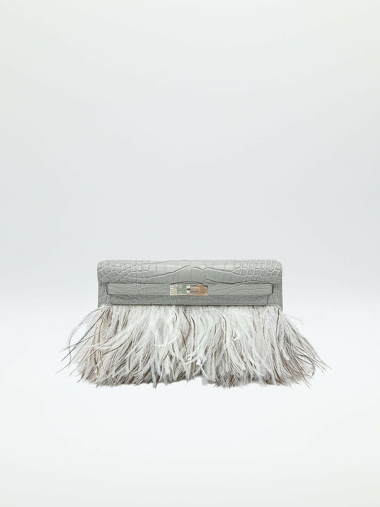 Pale grey crocodile-textured leather clutch with white ostrich feather fringe and silver-tone turn-lock closure