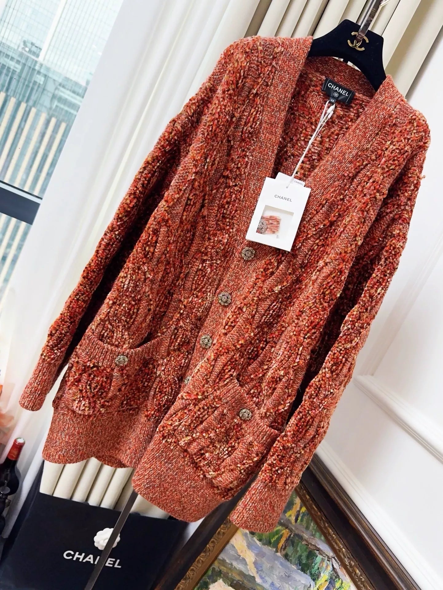 Chanel 22K orange cardigan