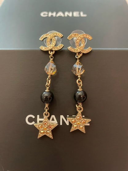 Chanel star tassel earrings