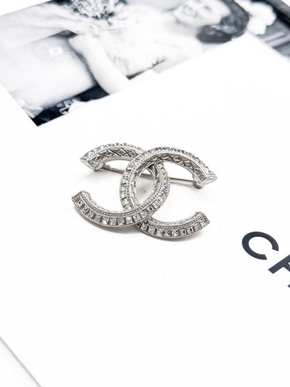 Chanel 23P silver brooch with full diamond embossing
