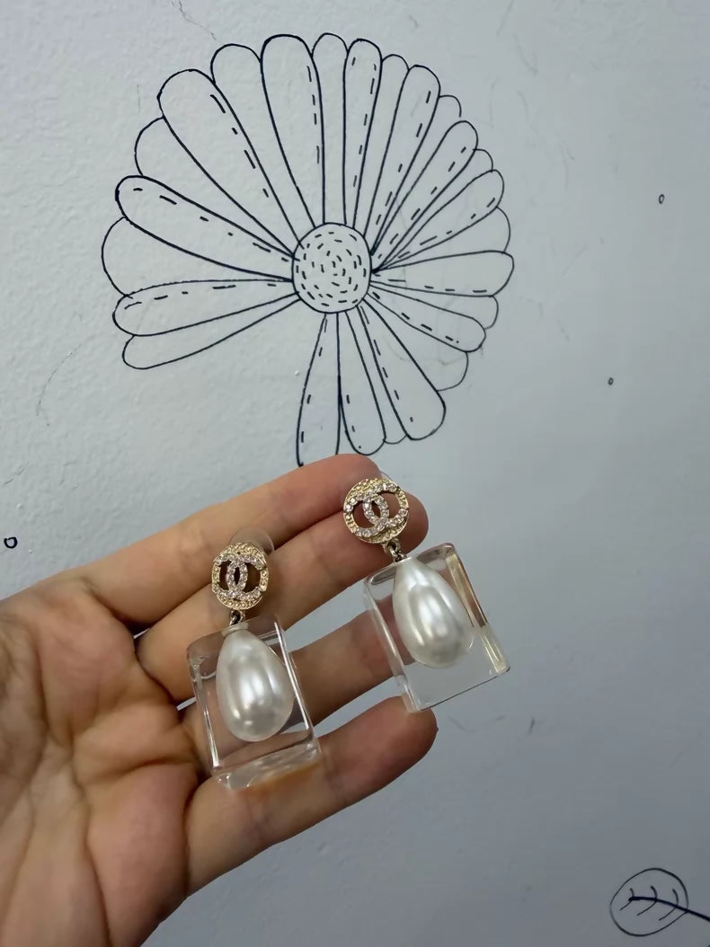 Chanel 19K gold pearl and acrylic earrings