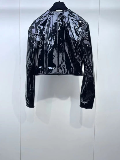 Chanel 23K black patent leather camellia jacket