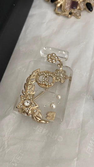 Chanel Double C perfume bottle brooch