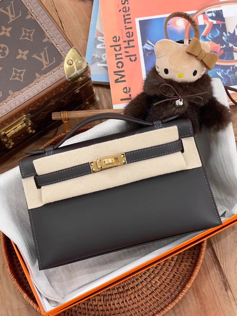 Hermès Kelly Pochette burgundy T3 Swift leather gold hardware