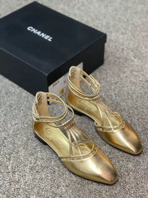 Chanel Karl Lagerfeld gold shoes