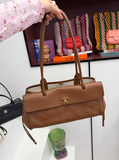 Chanel 26S brown calfskin baguette shoulder bag