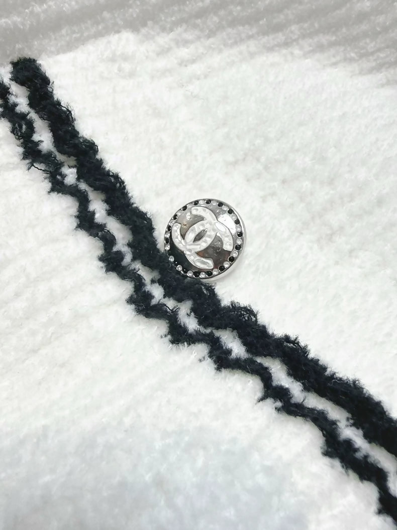 Chanel 23C white ribbed terry knit cardigan with black #5 beaded badge embroidered label