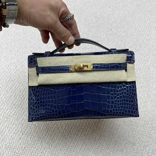 Hermès Kelly pochette M3 Blue shiny crocodile leather gold hardware