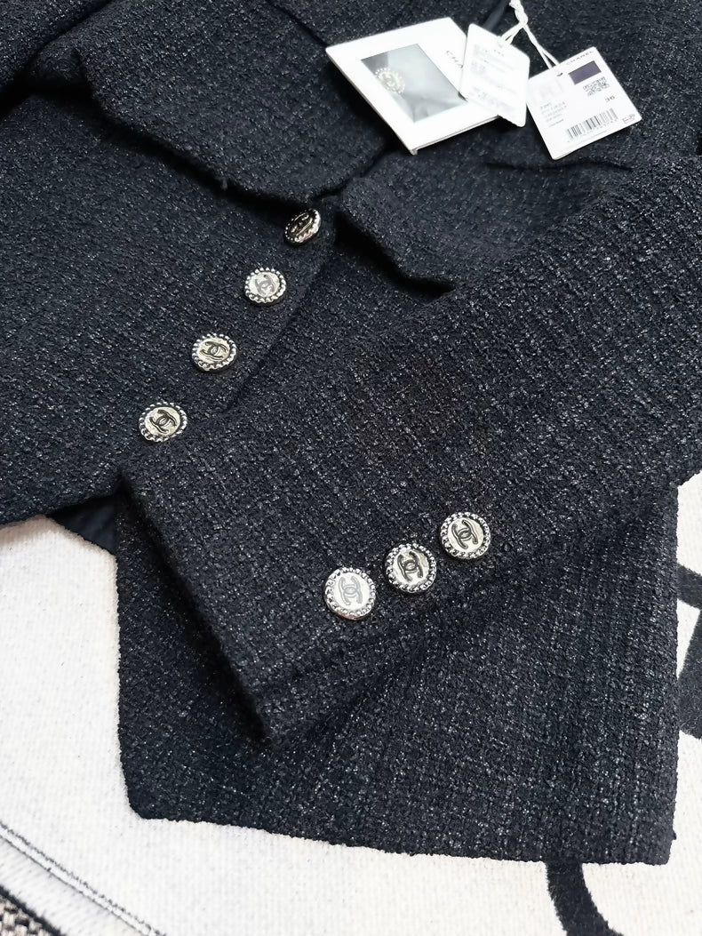 Chanel 22c black tweed jacket,