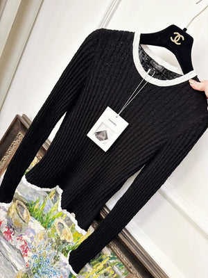 Chanel 22C black knit top