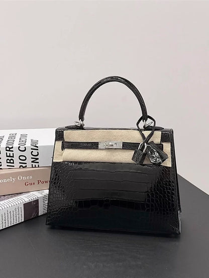 Hermès Kelly 25 black shiny crocodile leather palladium hardware