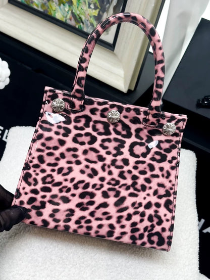 Chrome Hearts mini handbag in pink patent leather with leopard print