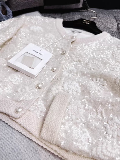 Chanel 21S  off-white knit cardigan with heavy embroidery, sequined camellia