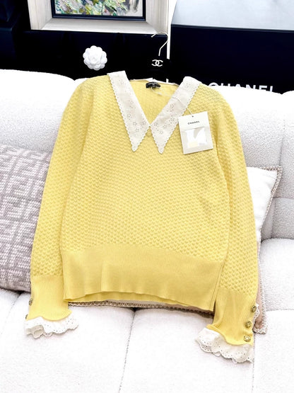 Chanel 24A yellow knit top with white lace trim on the collar and cuffs