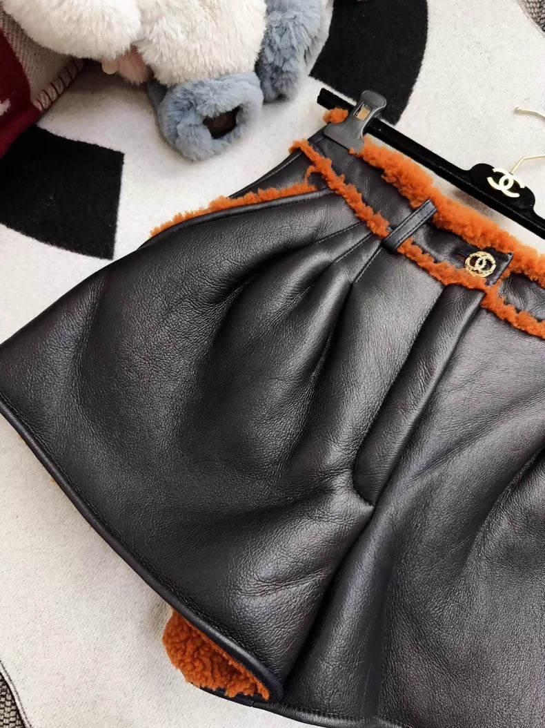 Chanel 23k black and brown shearling shorts