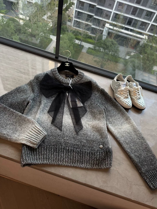 Chanel 24k black & gold bow top