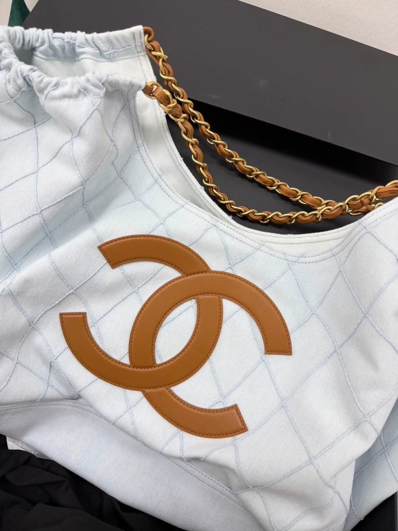 Chanel 26M Coco Beach light blue calfskin tote bag