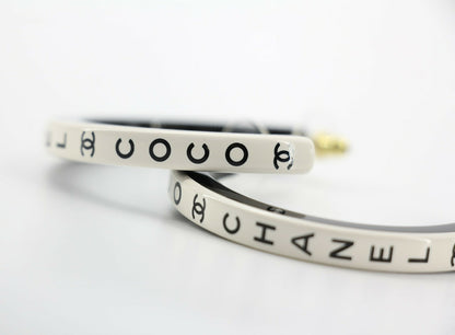 Chanel B22S Resin White Curved COCO Motif Hoop Stud Earrings