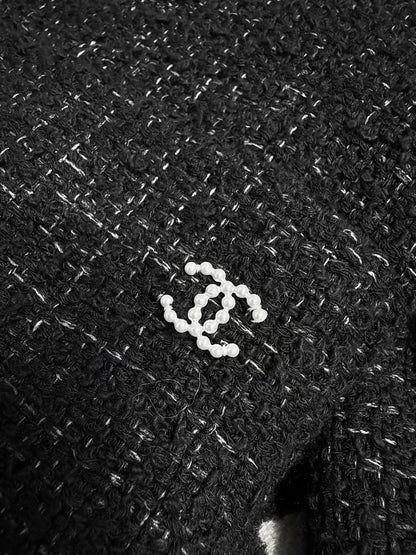 Chanel 25P black pearl-trimmed tweed jacket