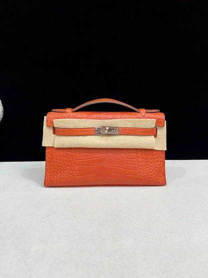 Hermes Kelly pochette Indian red matte alligator leather with palladium hardware