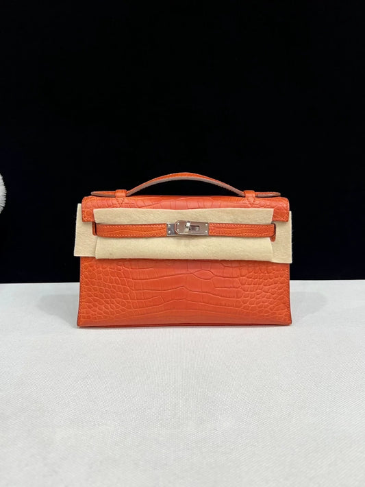 Hermes Kelly pochette Indian red matte alligator leather with palladium hardware