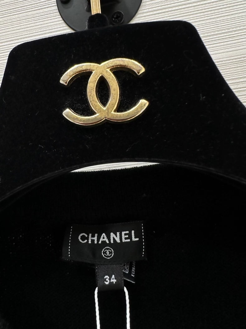 Chanel 24A black and gold cashmere vest with chain
