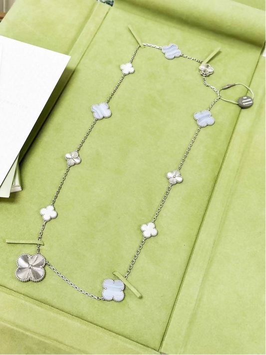 Van Cleef 
Arpels Magic Alhambra long necklace in white gold, mother of pearl and chalcedony