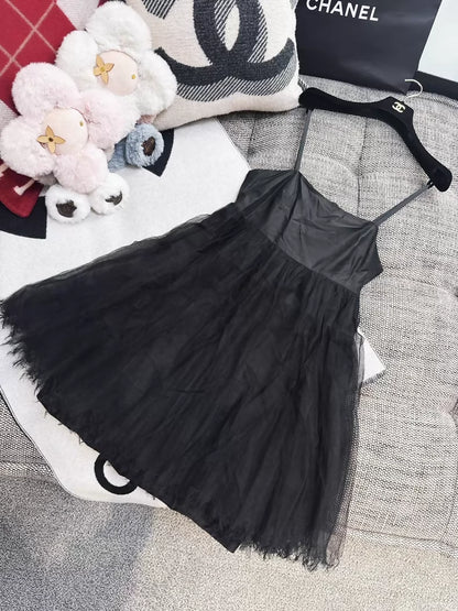 Chanel pink dress with a black tulle lining