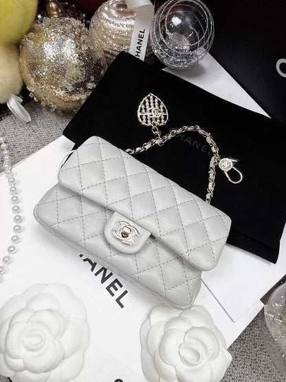 CHANEL 25A CF mini light grey quilted lambskin heart charm bag