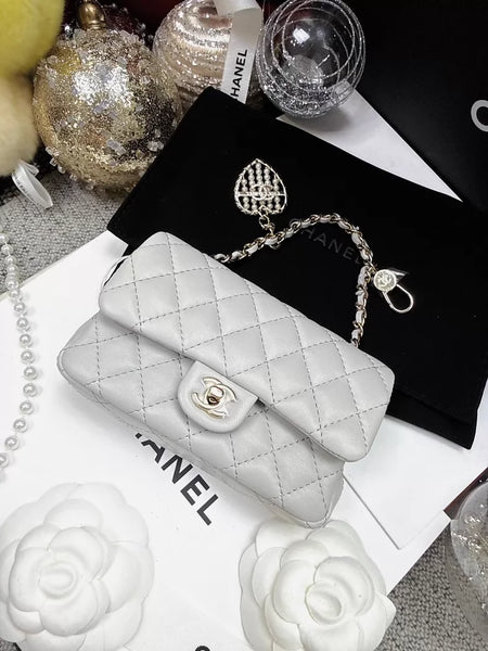 CHANEL 25A CF mini light grey quilted lambskin heart charm bag