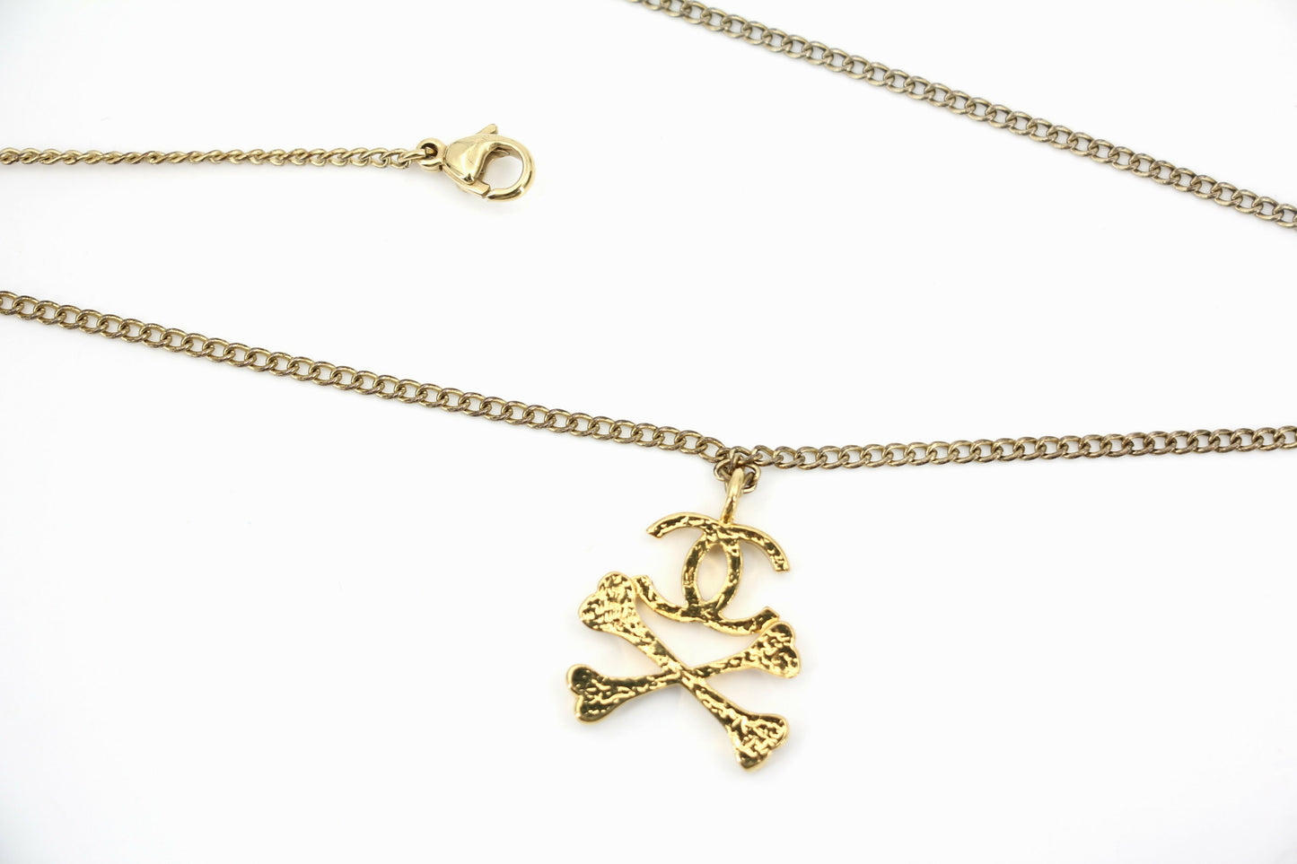 Chanel Vintage 03P Gold-plated CC Enamel White Skull Necklace