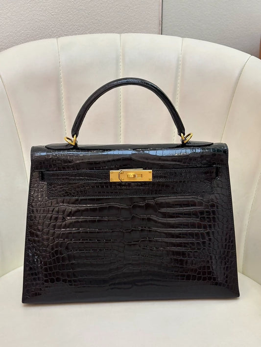 Hermes Kelly 32 shiny black crocodile leather gold hardware