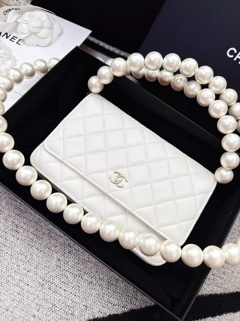 Chanel 20k ecru gold pearl chain WOC shoulder bag