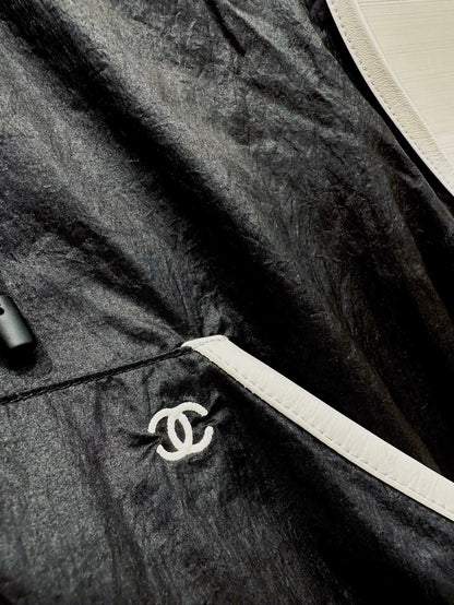 Chanel 26M Coco Beach black hooded vest, F36.