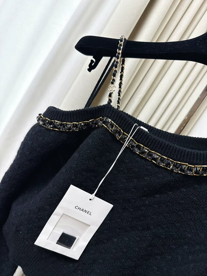 Chanel 23B black cashmere sweater, adorned with chains, pearls and sequins