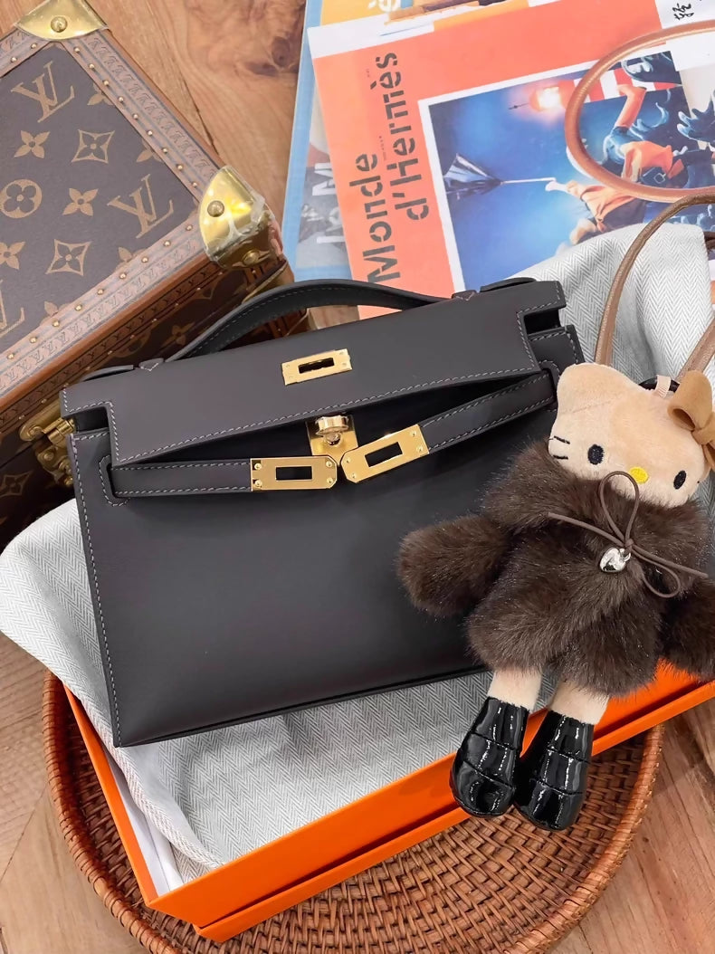 Hermès Kelly Pochette burgundy T3 Swift leather gold hardware