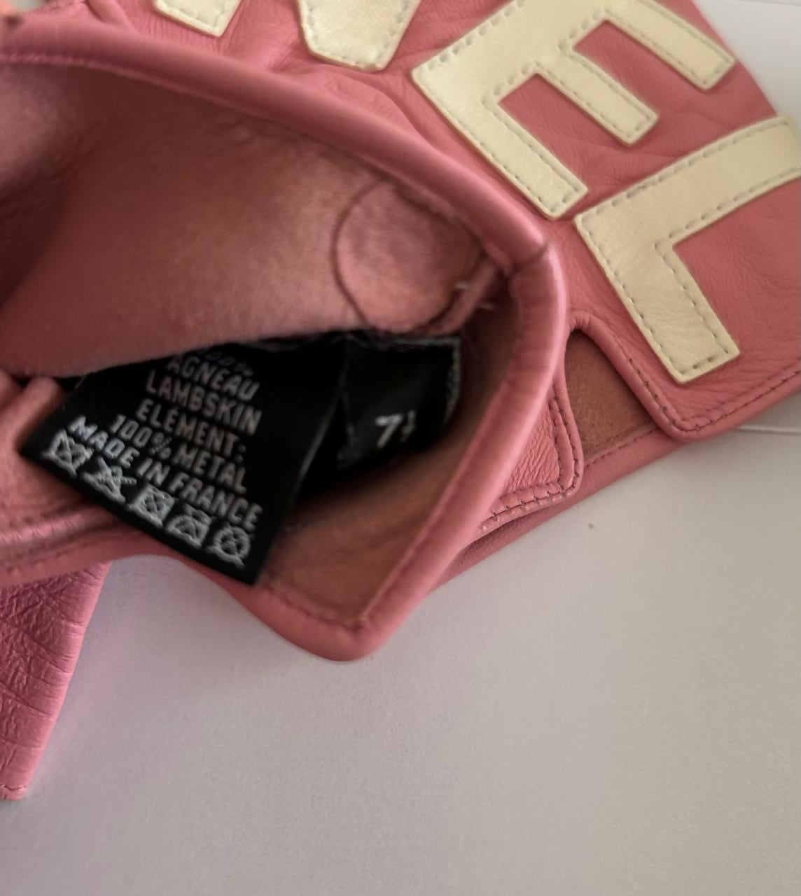 Chanel pink fingerless gloves