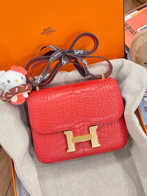 Hermès Constance Mini A5 azalea red, matte Alligator leather gold hardware