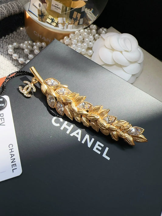 CHANEL classic golden wheat rhinestone brooch
