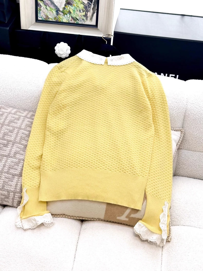Chanel 24A yellow knit top with white lace trim on the collar and cuffs