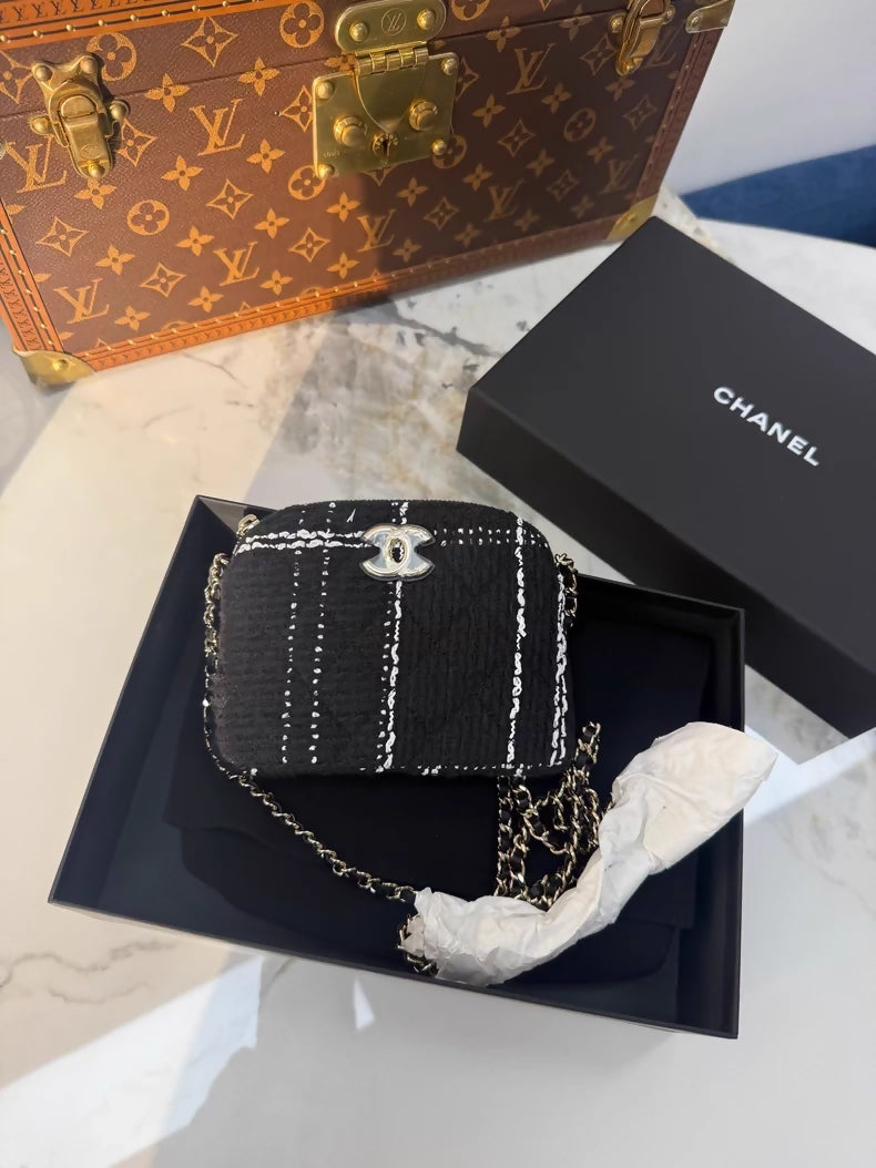 Chanel VIC 24k black and white checkered tweed mini shell bag with chain strap