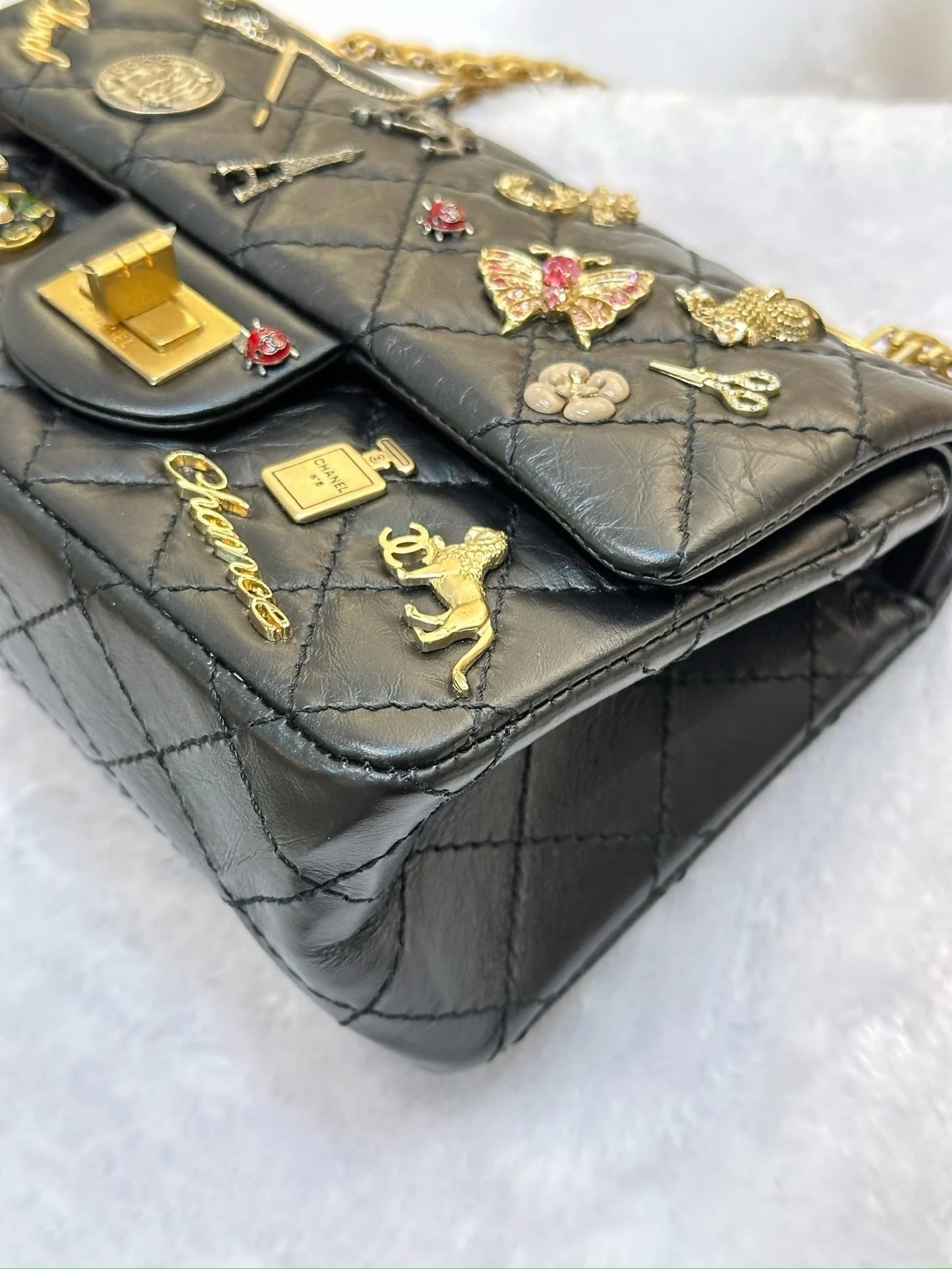 Chanel Black Quilted Aged Leather Lucky Charms Reissue 2.55 Classic 224 Flap Bag