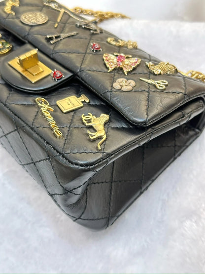 Chanel Black Quilted Aged Leather Lucky Charms Reissue 2.55 Classic 224 Flap Bag
