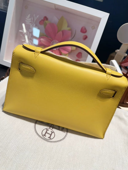 Hermes Kelly Pochette yellow swift leather palladium hardware