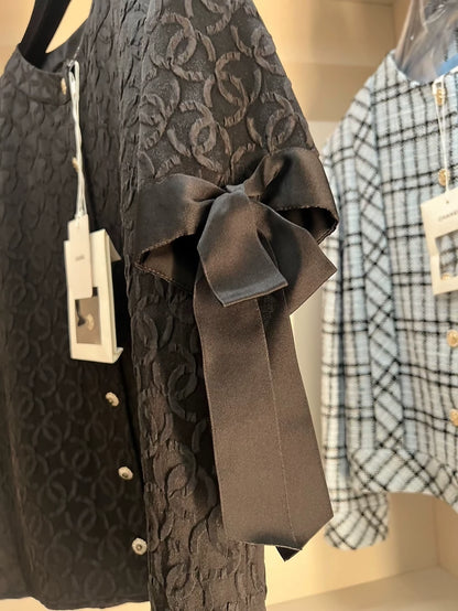 Chanel 25k black shirt with bow sleeves